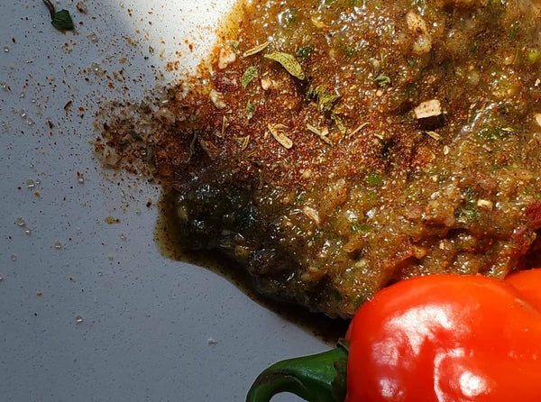 Cole's Kitchen Organic Jerk Marinade showing authentic Caribbean spice blend and fresh peppers.